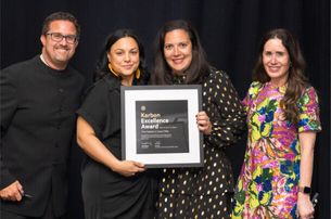 Karbon co-founder Ian Vacin and Karbon Chief Customer Officer Elizabeth Blass presenting the 2025 Karbon Excellence Award for Client Excellence
